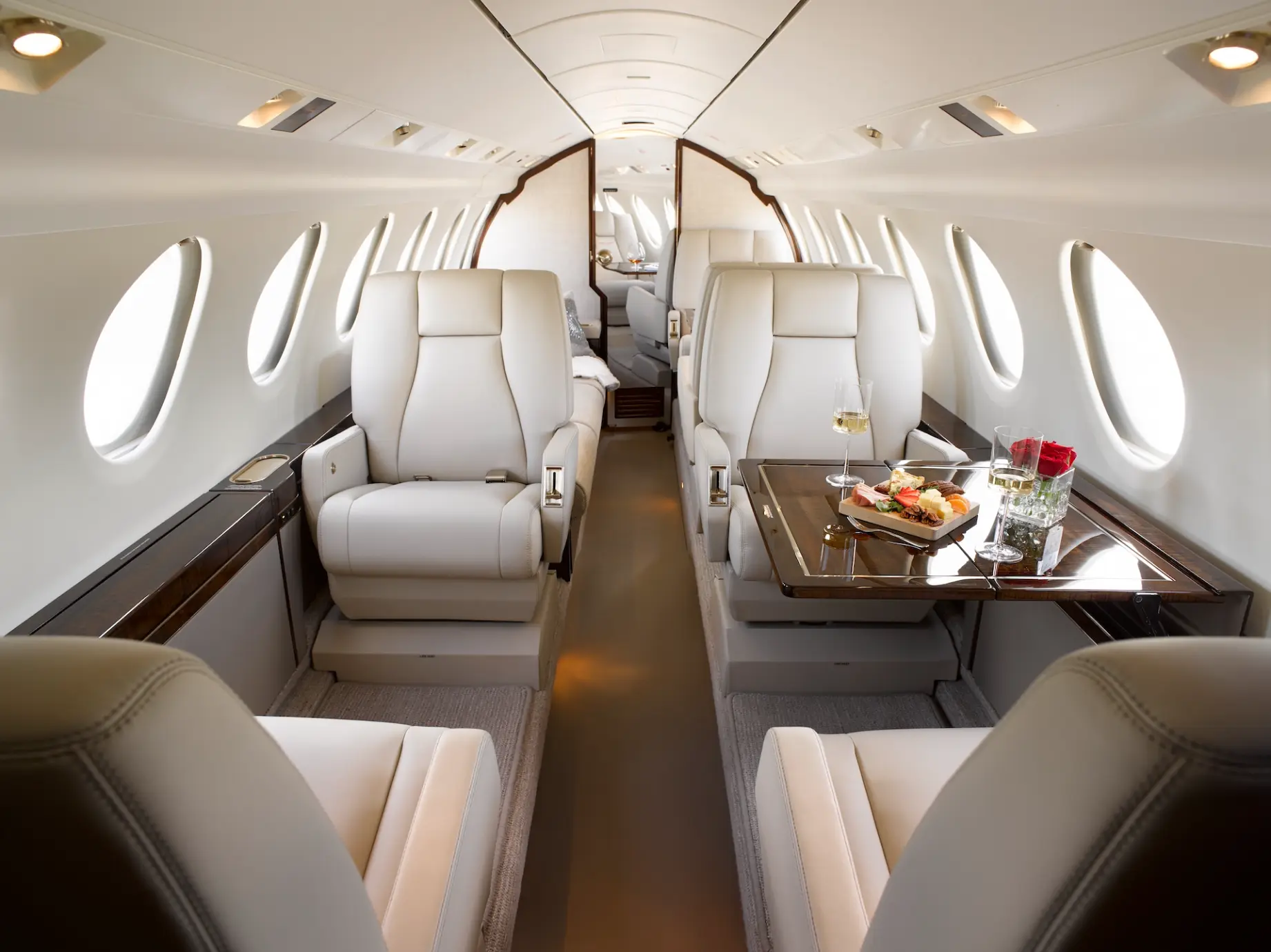 Falcon 50 cabin interior — roomy super-midsize stand-up cabin with flat floor for private charter flights to the Caribbean and East Coast