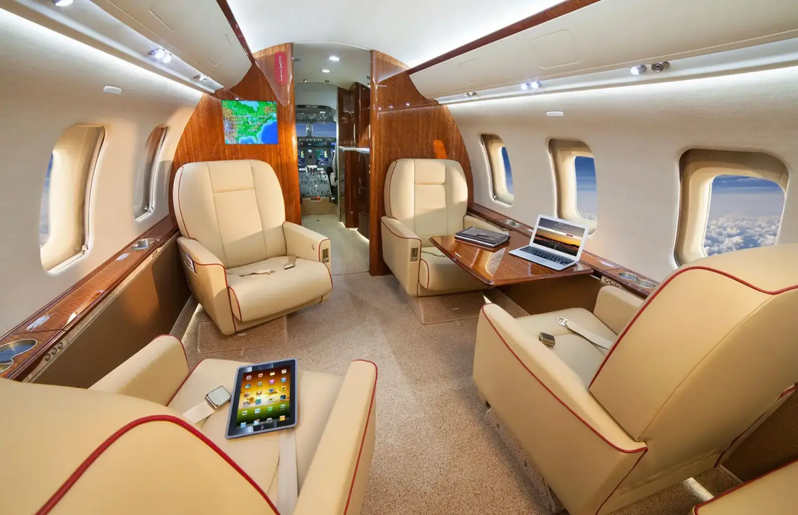 Challenger 605 galley and enclosed lavatory — private charter interior amenities